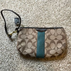 Coach mini purse. Can be wallet, but little larger than wallet.